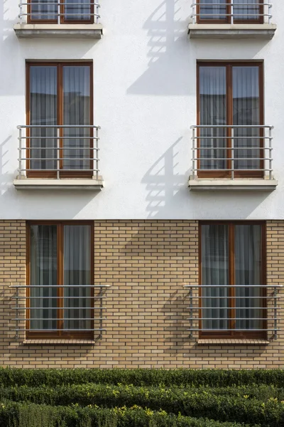 Wooden windows in multi family house — Stock Image Wooden windows in multi family house Royalty Free Stock Photos