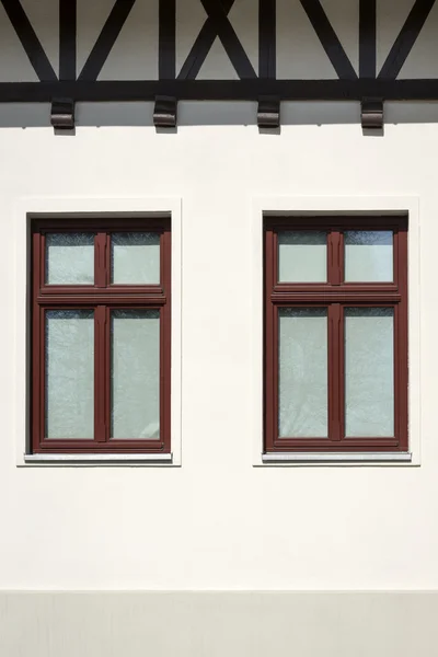 Bronze wooden window in white wall — Stock Image Bronze wooden window in white wall Royalty Free Stock Images