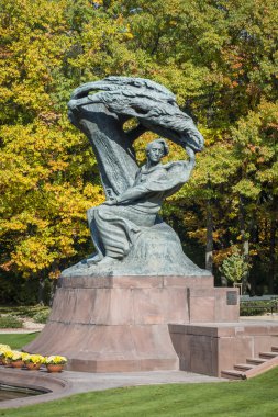 Autumn in Lazienki park with monument of Friderick Chopin, Warsaw clipart