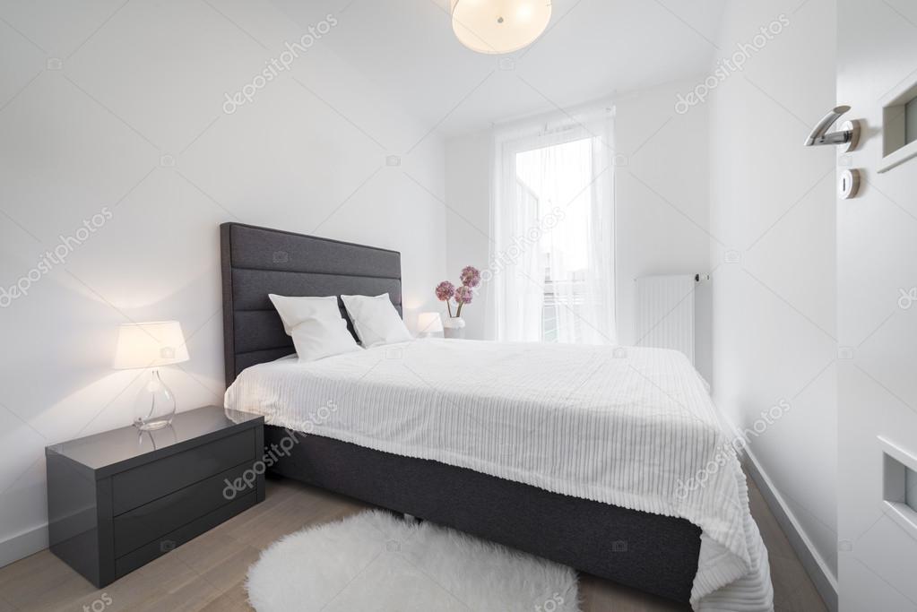 Stylish white bedroom Stock Photo by ©jacek_kadaj 43905047