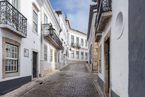 View of the traditional historical streets of Faro city located in Portugal, Europe.
