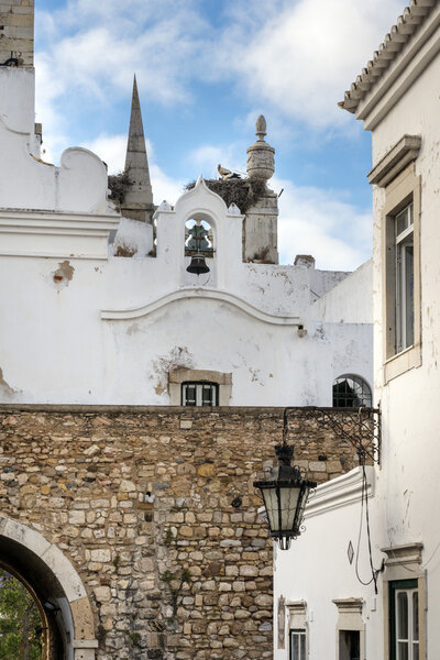 Church bells in Old Town historic district of Faro, Portugal