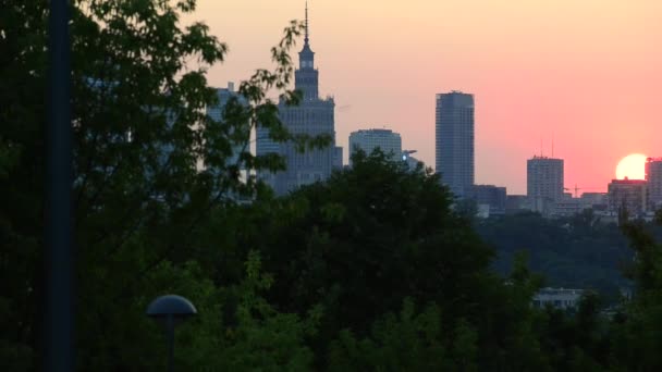 City of Warsaw downtown skyline at sunset in Poland. — Stock Video