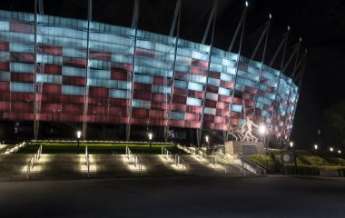 Entrance to National Stadium in Warsaw at night. clipart