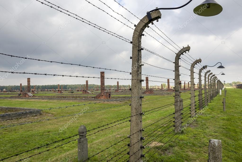Barbed Fence With Lamp In Auschwitz Concentration Camp Poland Brzezinka Poland October 13 2018 Life Barbed Wire Encloses The Auschwitz Ii Birkenau Extermination Camp 1 Million People Mostly Jews From Allover