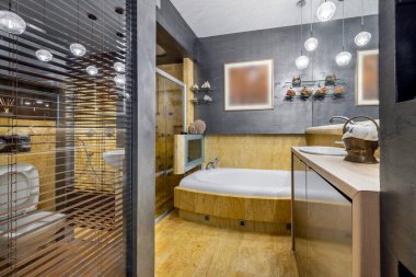 Stylish and expensive bathroom interior design with yellow marble finishing