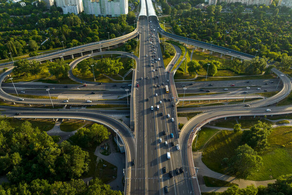 Aerial drone top view of highway multilevel junction in urban populated area, Warsaw, Poland