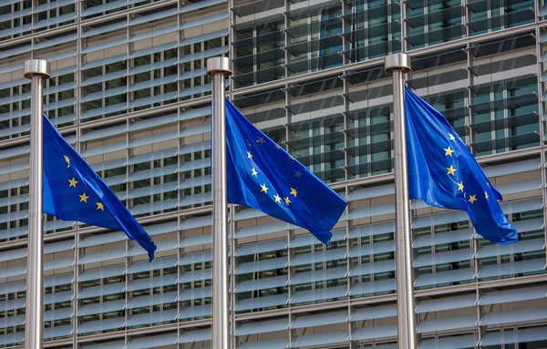 European flags in front of the Berlaymont building, headquarters — Stock Photo, Image