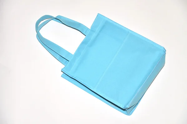 Sky blue nano fabric like shopping bag isolated on white — Stock Photo, Image