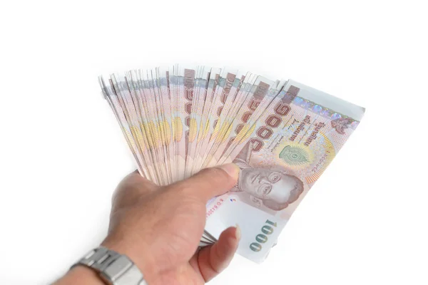 Thai bank notes in hand — Stock Photo, Image