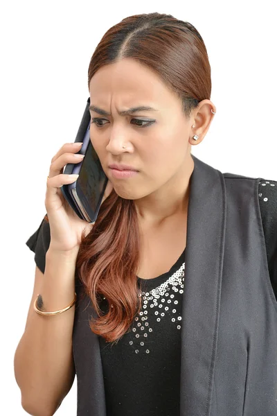 Pretty woman worried by mobile phone — Stock Photo, Image