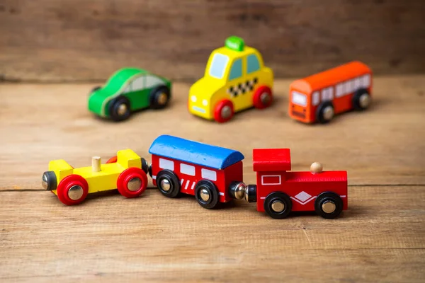 Crianças Brinquedo Trem Carros Ônibus Escolar Isolado Fundo Madeira — Fotografia de Stock