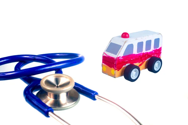 Toy Wood Ambulance Car Stethoscope White Background Close — Stock Photo, Image