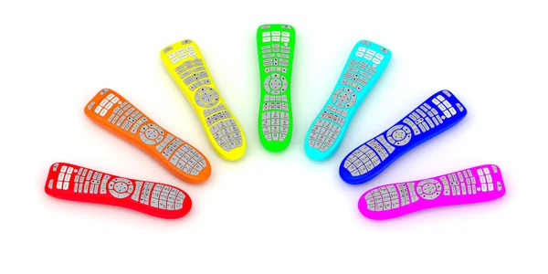 Remote controls of rainbow colors — Stock Photo, Image