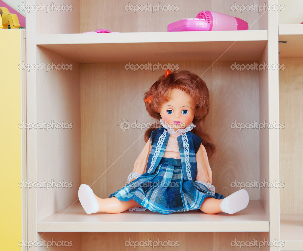 Doll on a shelf — Stock Photo © aposelenov 19216669