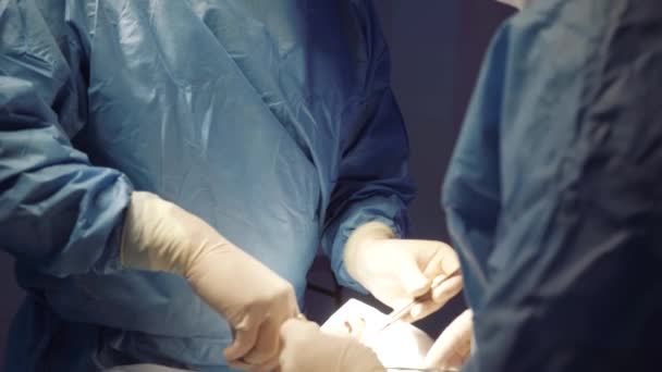Doctors Hands Takes Medical Gloves Surgery Surgeon Has Finished His — Stok Video