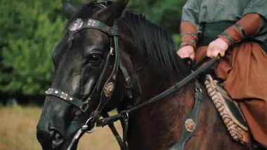 Zaporozhye Cossack on horseback. Ukrainian Cossack in the Zaporozhian Sich. Strong people. Patriots of their country.
