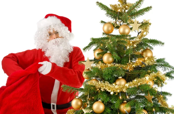 Papai Noel chegando em sua bolsa — Fotografia de Stock