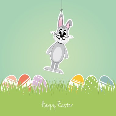 Mutlu Paskalya gri tavşan renkli yumurta çimen