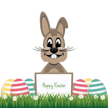 tahta renkli yumurta arkasındaki kahverengi tavşan