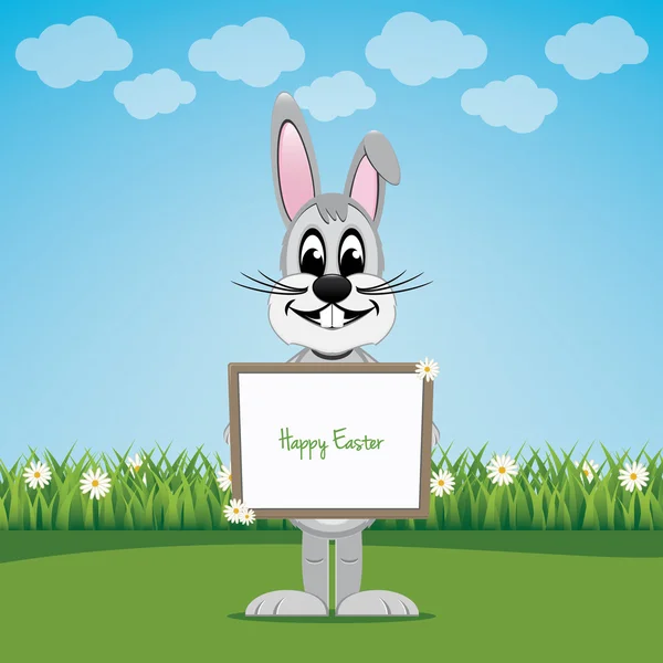 ウサギ春の芝生の上のサインの保持ハッピー イースター — ストックベクタ