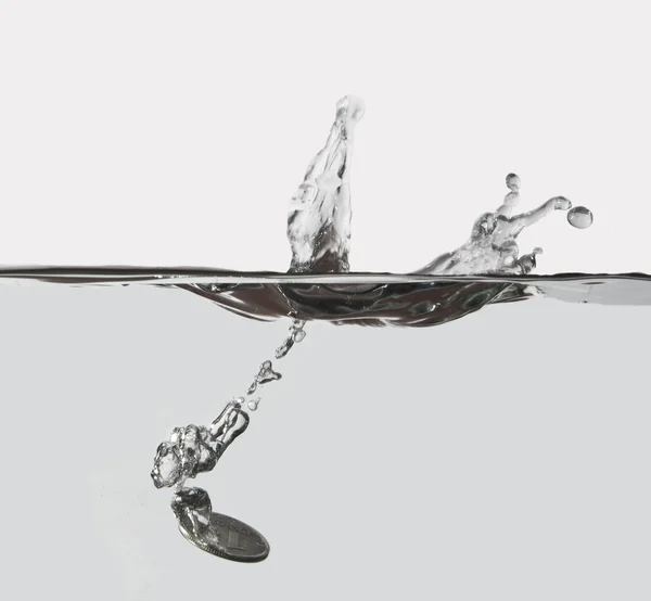 Splash düşen paraları. — Stok fotoğraf