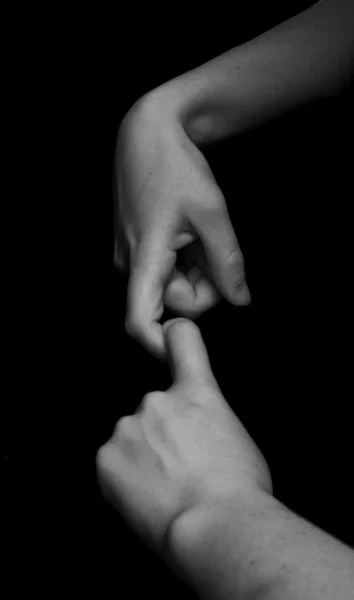 Black-and-white photography. Women's hands close-up. — Stock Photo, Image