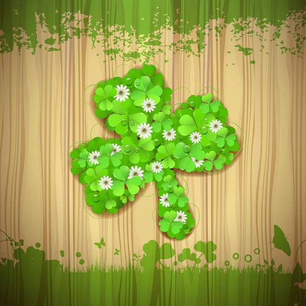 Wood background with clover — Stock Vector