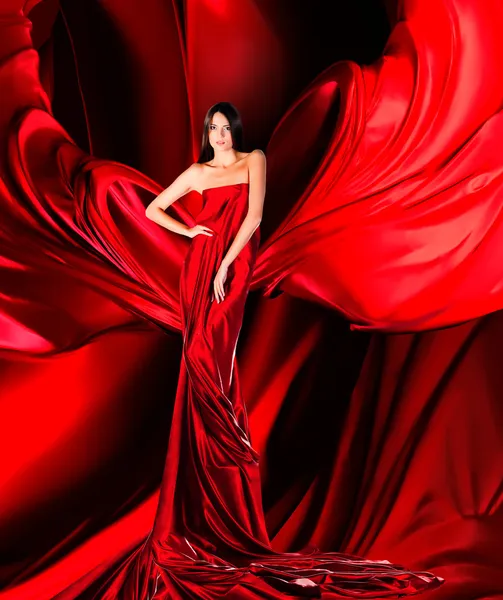 Vrouw in rode jurk Rechtenvrije Stockafbeeldingen