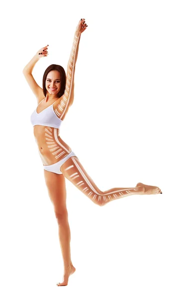 Atractiva mujer deportiva delgada con las manos en alto y la medición de hologra —  Fotos de Stock
