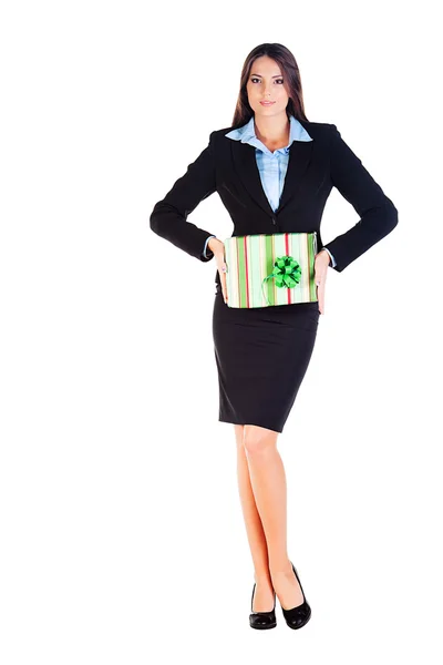 Business woman holds the gift — Stock Photo, Image