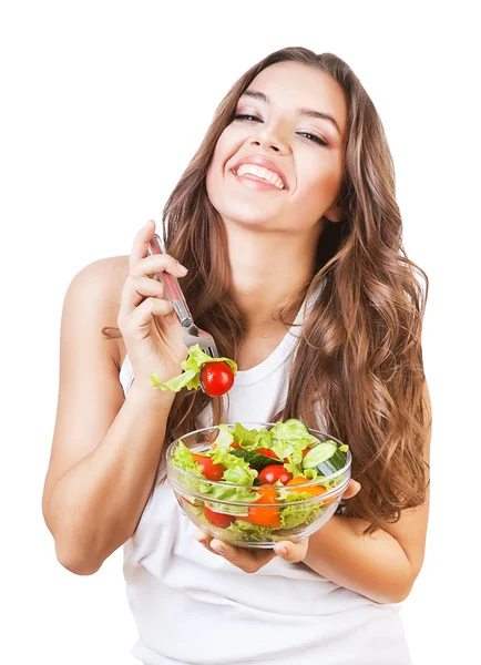 Chica feliz sosteniendo tenedor con ensalada —  Fotos de Stock