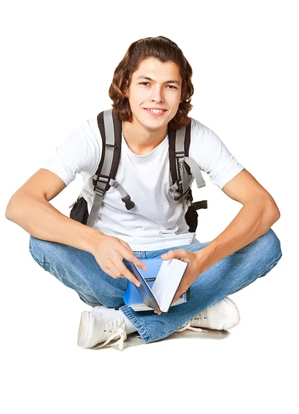 Student met een leerboek en satchel — Stockfoto