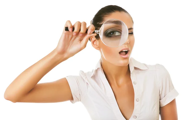 Woman with magnifying glass — Stock Photo, Image