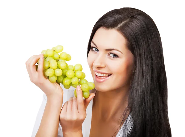 Fröhliche Frau und grüne Trauben — Stockfoto