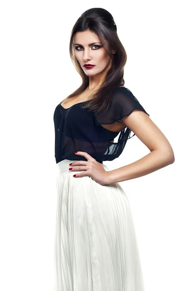 Slim woman in white skirt and black top — Stock Photo, Image