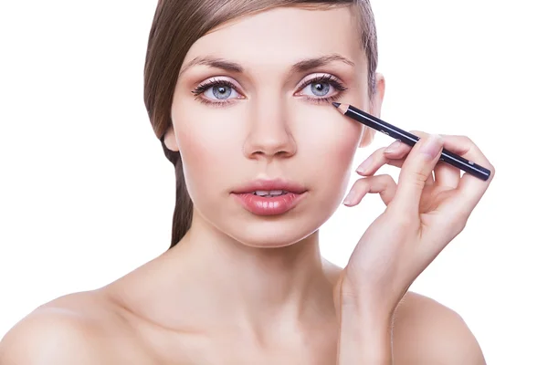 Natural woman with cosmetic pencil — Stock Photo, Image