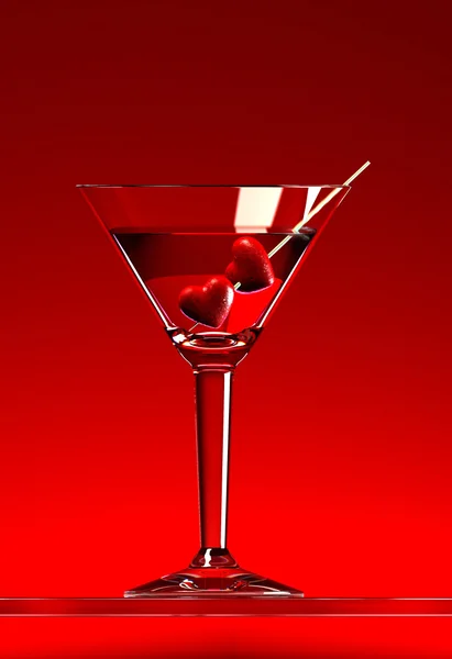 Zwei Herzen am Stick im Martini-Cocktail — Stockfoto