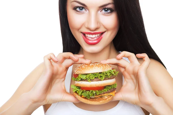 Linda chica feliz sosteniendo hamburguesa — Foto de Stock