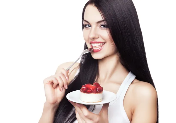 Hungry happy girl with cake Stock Image