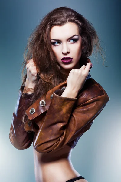 Pretty attractive erotic woman in brown jacket — Stock Photo, Image