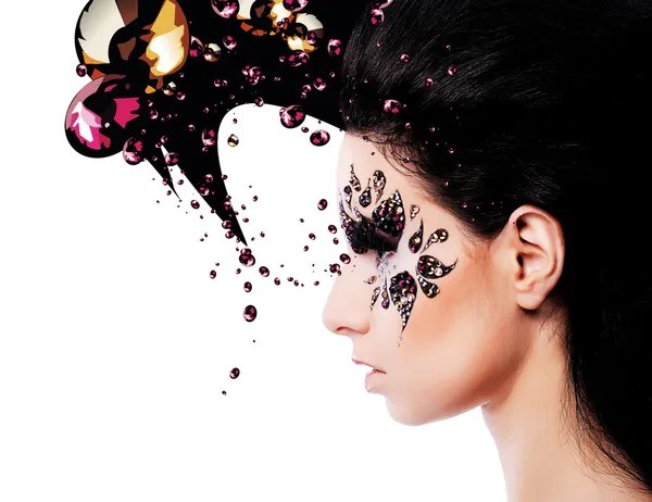 Woman and face art with a lot of rhinestones — Stock Photo, Image