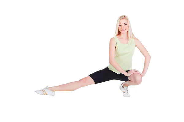 Flickans motion placering på ett ben — Stockfoto