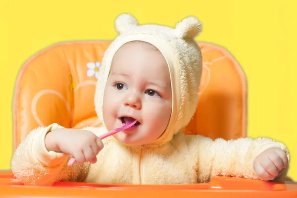 Baby boy eating oatmeal — Stock Photo, Image