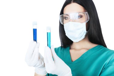 Attractive scientist holding two tubes