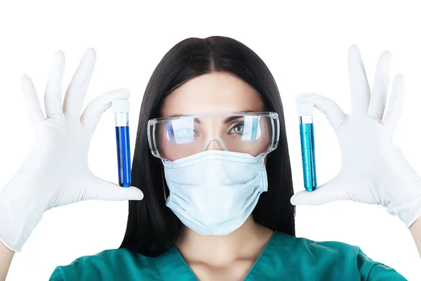 Attractive scientist holding tubes — Stock Photo, Image