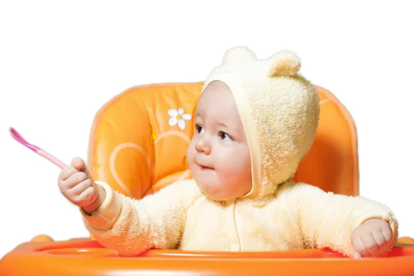 Little boy eating with spoon — Stock Photo, Image