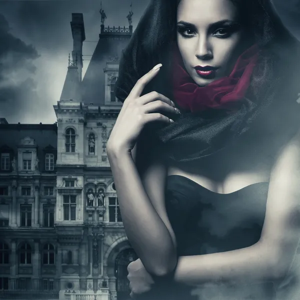 Sexy woman in black hood and castle — Stock Photo, Image