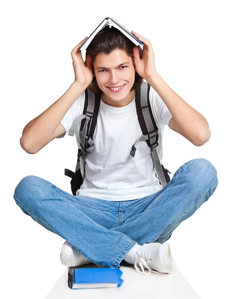 Student textbook satchel sitting — Stock Photo, Image