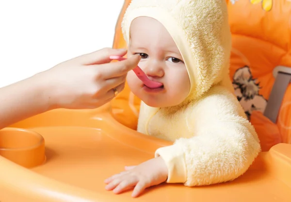 Feeding cute baby boy — Stock Photo, Image